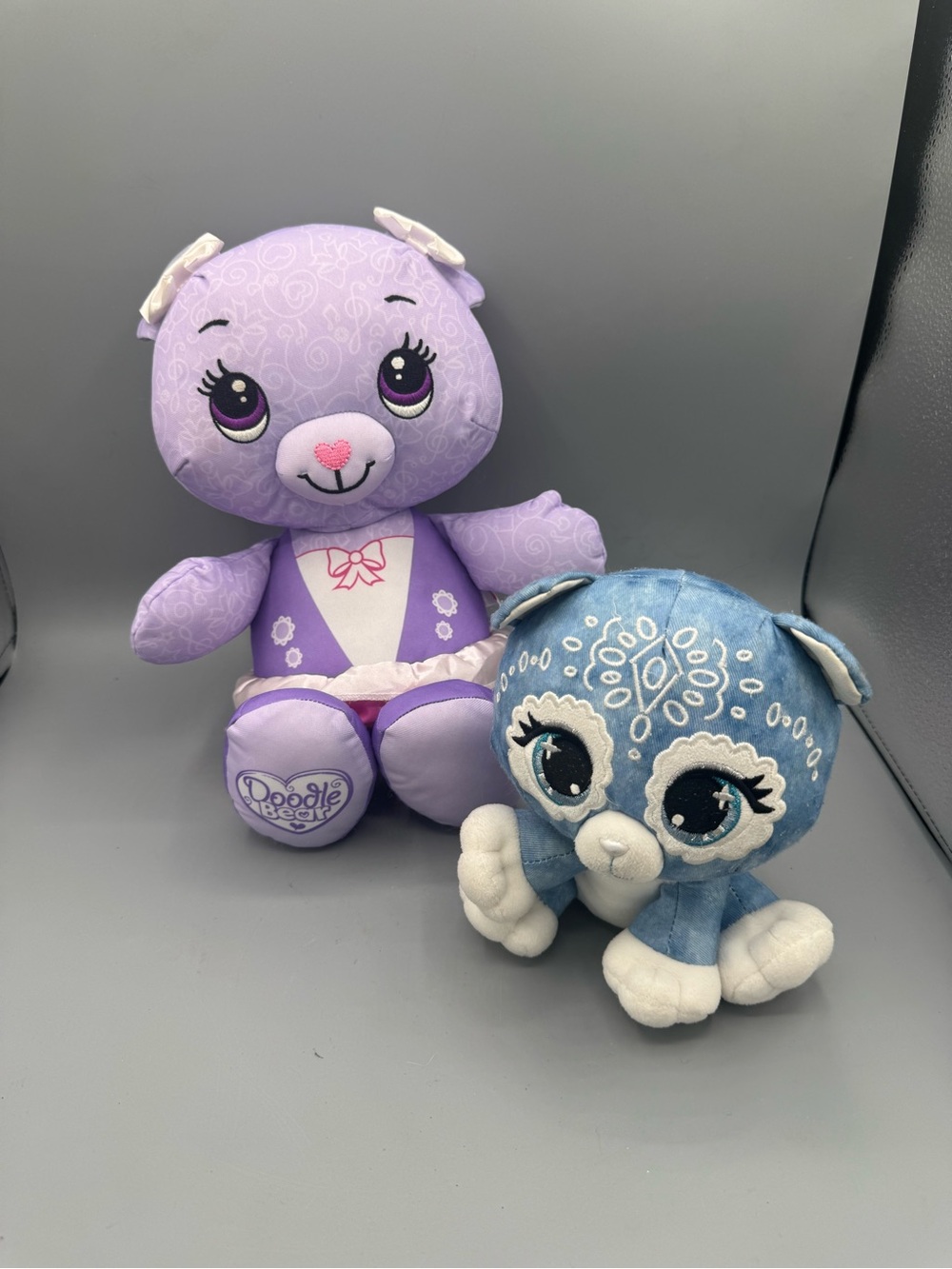 Fisher-Price Doodle Bear plushies from the early 2010s